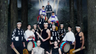 Kodo with instruments and in costume in the woods 