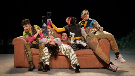 ive performers struggle to get a seat on a sofa too small to accommodate them all comfortably