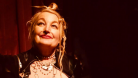Jane Siberry looking up and smiling 