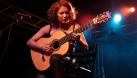 Sue Foley playing guitar on stage © Doug Hardesty