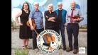 The five members of the Rideau Ramblers outside. A member is holding his guitar and another member is holding his violin. © Dawn Cameron