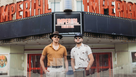 Brothers Wilde in front of a cinema.