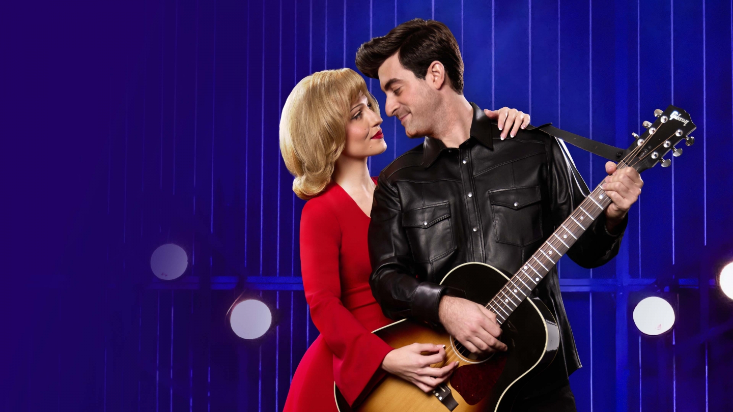 Two performers onstage in A Beautiful Noise: The Neil Diamond Musical.