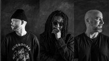 Three performers in black-and-white portraits, each facing a different direction. ©  David Leclerc